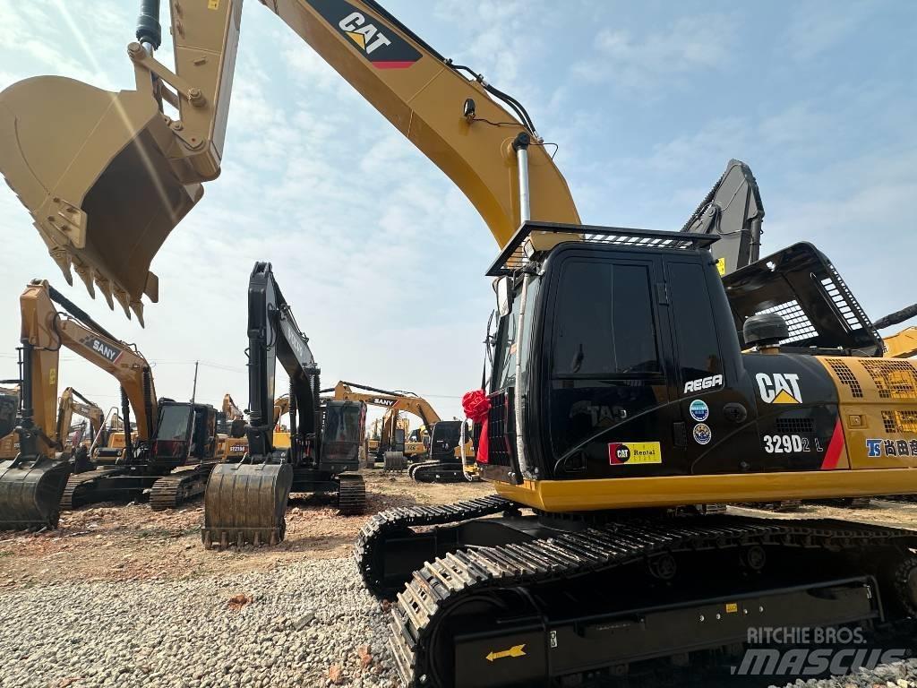 CAT 329 D2L Vidēja lieluma ekskavatori 7 t - 12 t