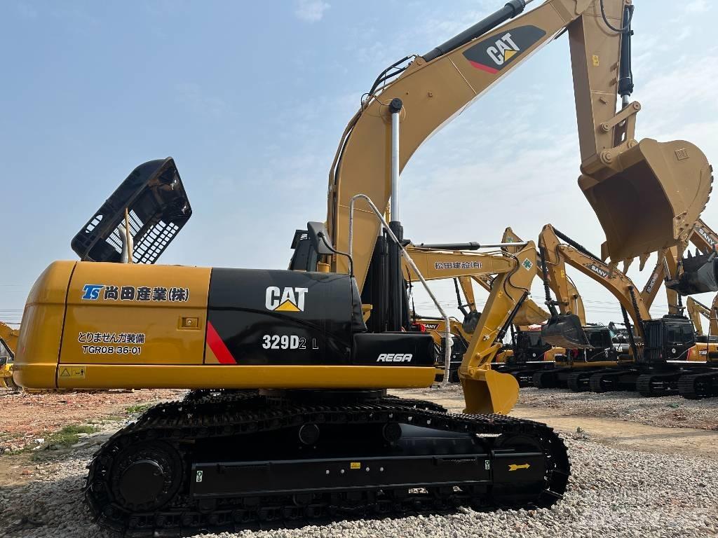 CAT 329 D2L Vidēja lieluma ekskavatori 7 t - 12 t