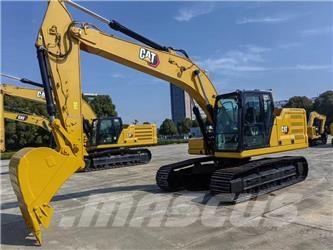 CAT 2022 CAT 323 Ekskavatori uz riteņiem