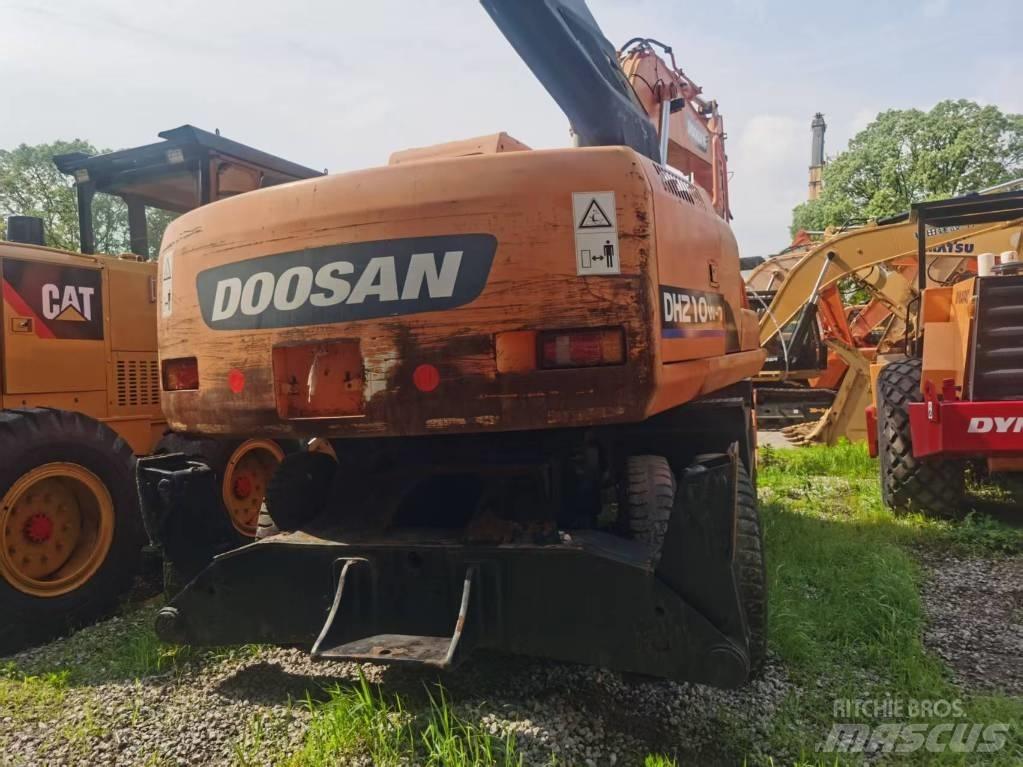 Doosan DH 210 W Ekskavatori uz riteņiem