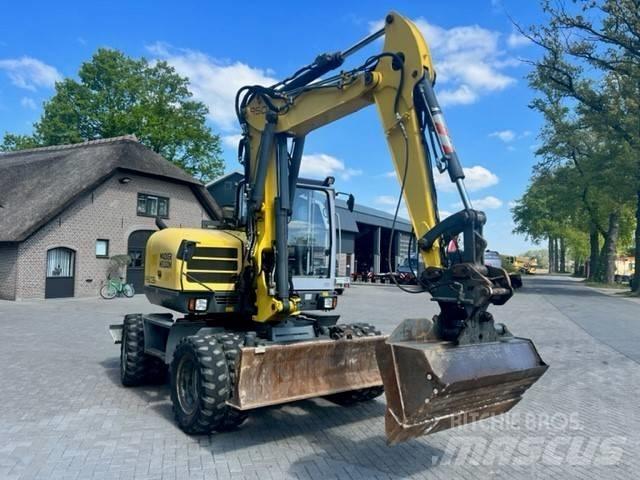 Neuson 9503 Ekskavatori uz riteņiem