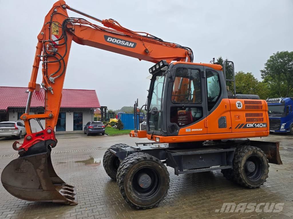 Doosan DX 140-W Ekskavatori uz riteņiem