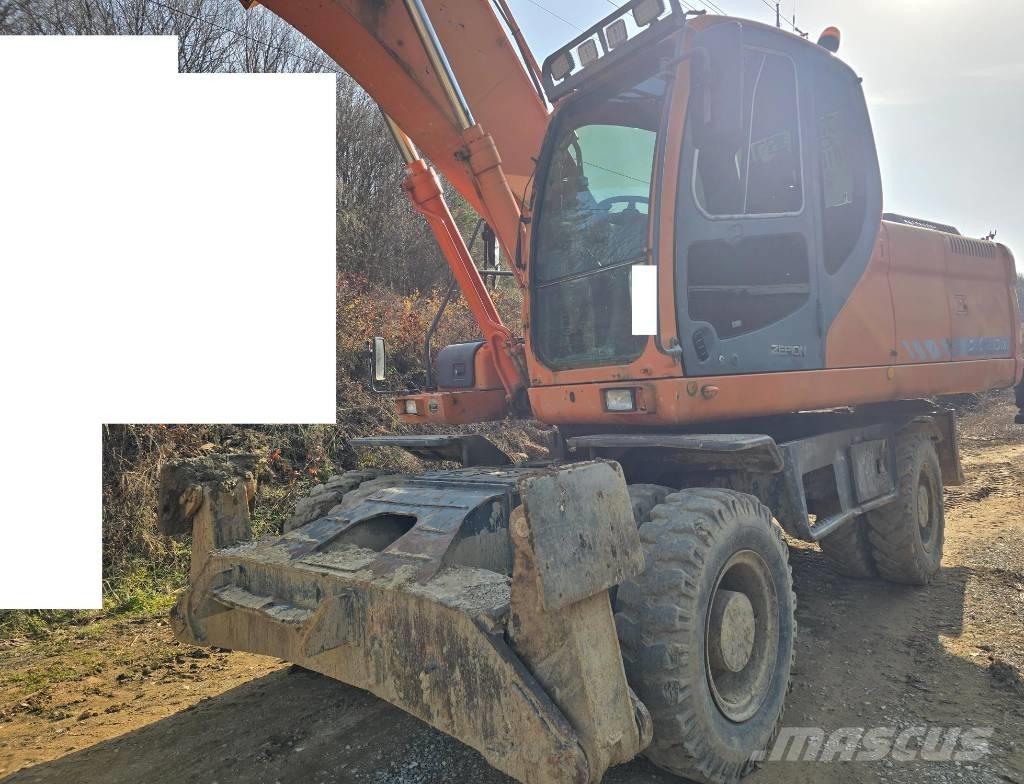 Doosan DX 210 W Ekskavatori uz riteņiem