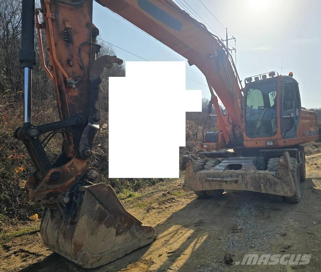 Doosan DX 210 W Ekskavatori uz riteņiem