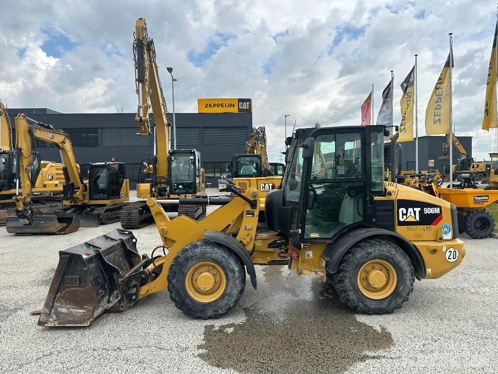 CAT 906 Iekrāvēji uz riteņiem