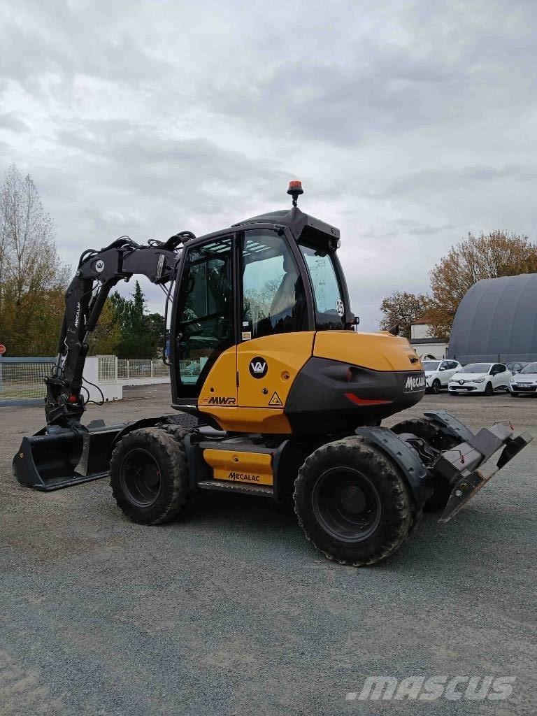 Mecalac 9 MWR Ekskavatori uz riteņiem