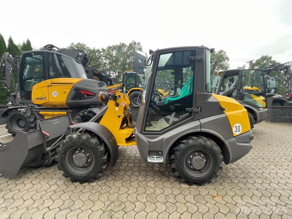 Mecalac AX700 Iekrāvēji uz riteņiem