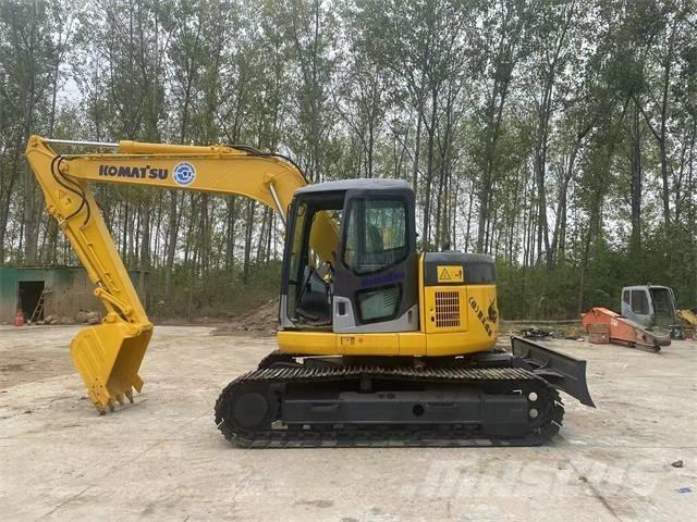 Komatsu PC128US Kāpurķēžu ekskavatori