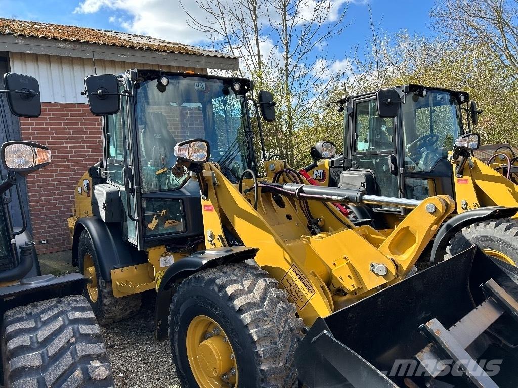 CAT 906 Iekrāvēji uz riteņiem