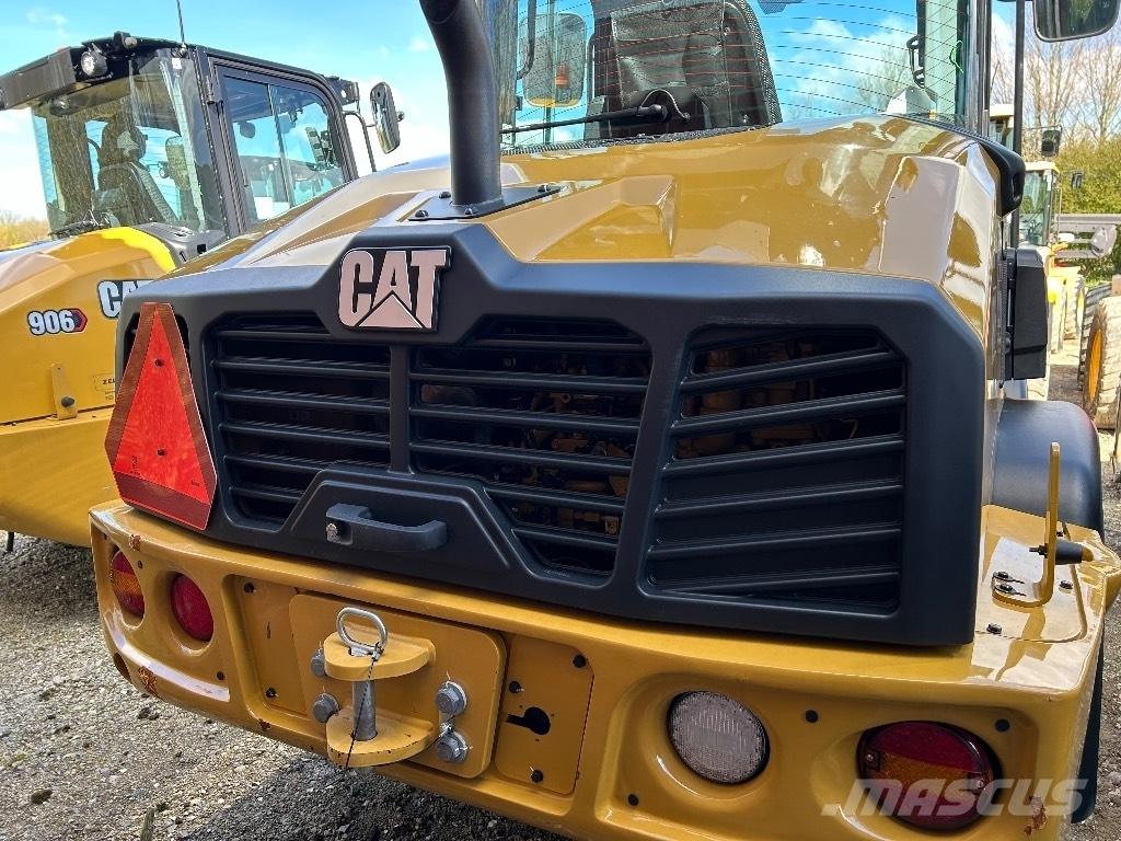 CAT 906 Iekrāvēji uz riteņiem