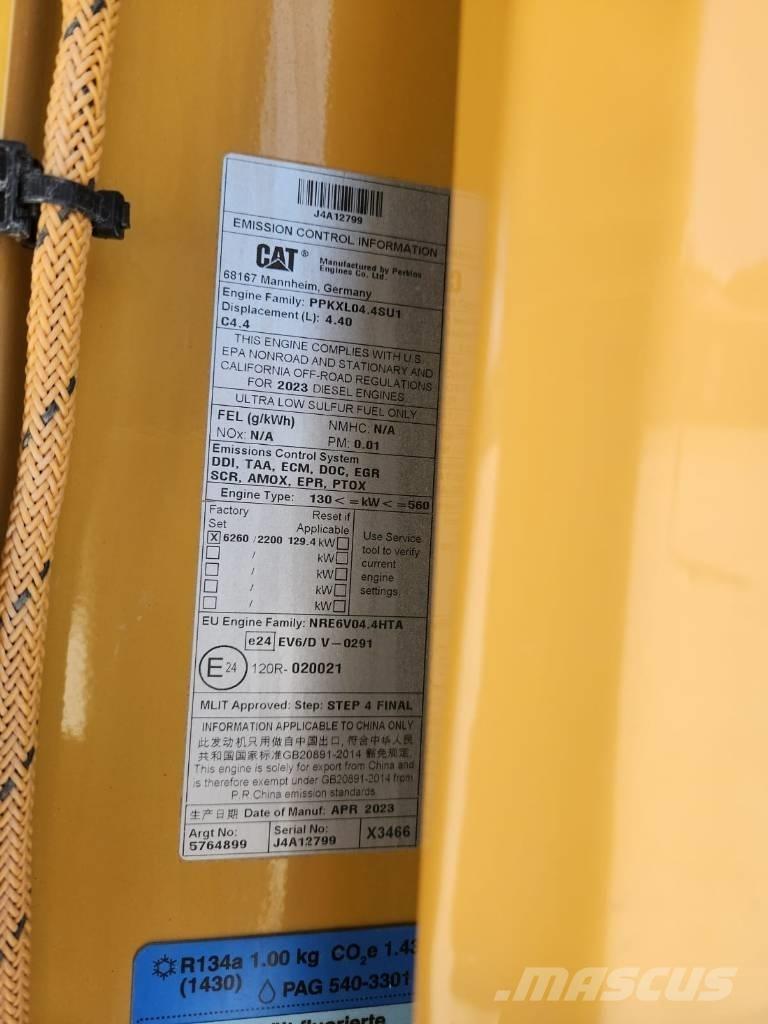 CAT M 318 Ekskavatori uz riteņiem