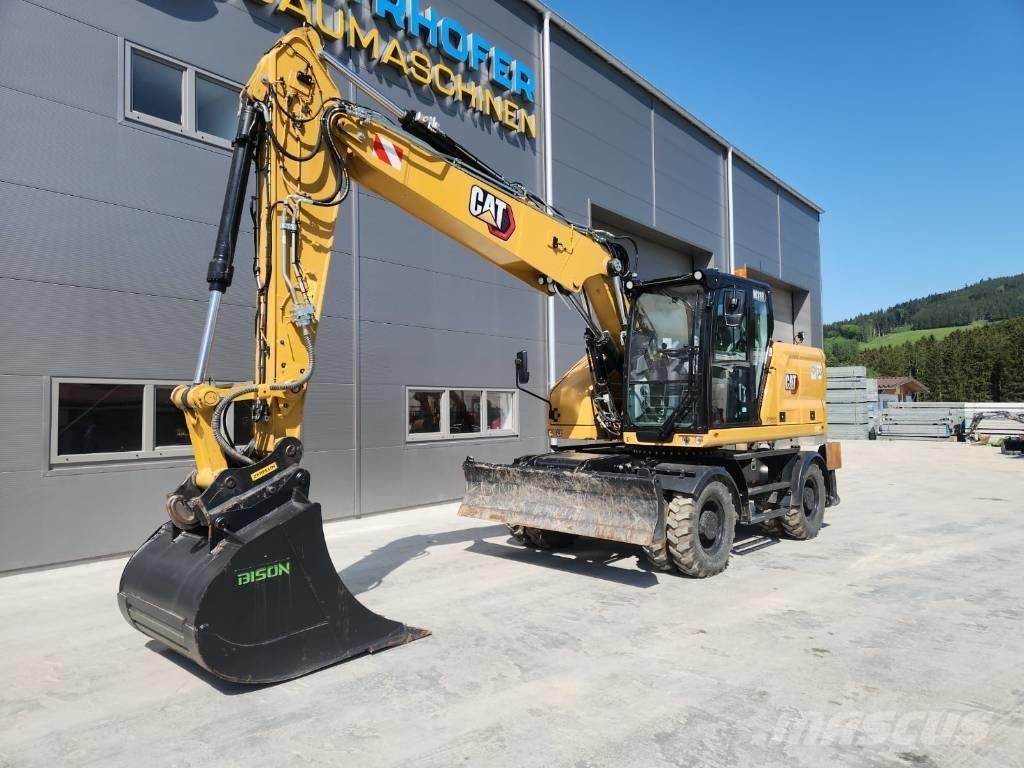 CAT M 318 Ekskavatori uz riteņiem