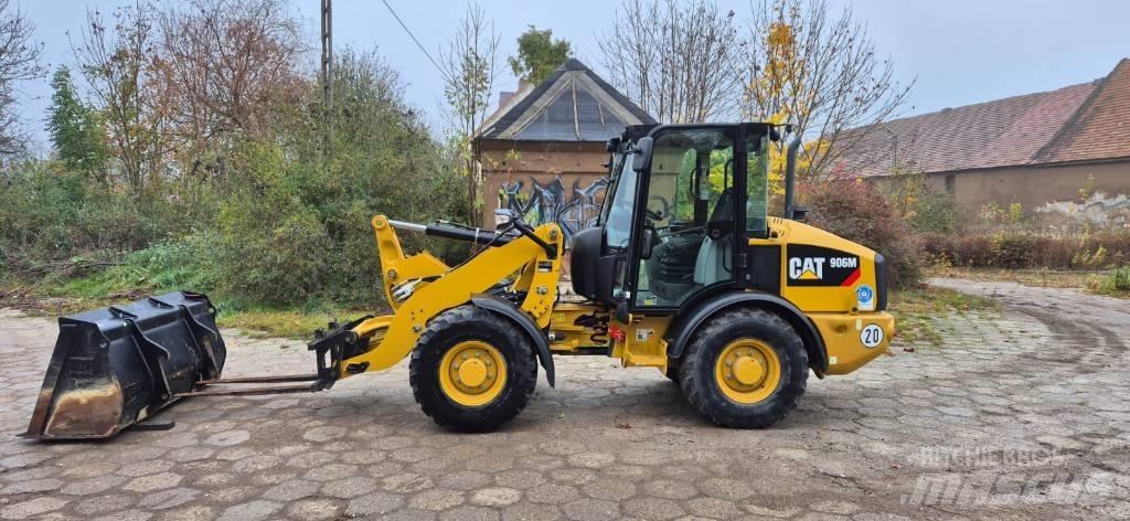 CAT 906 Iekrāvēji uz riteņiem