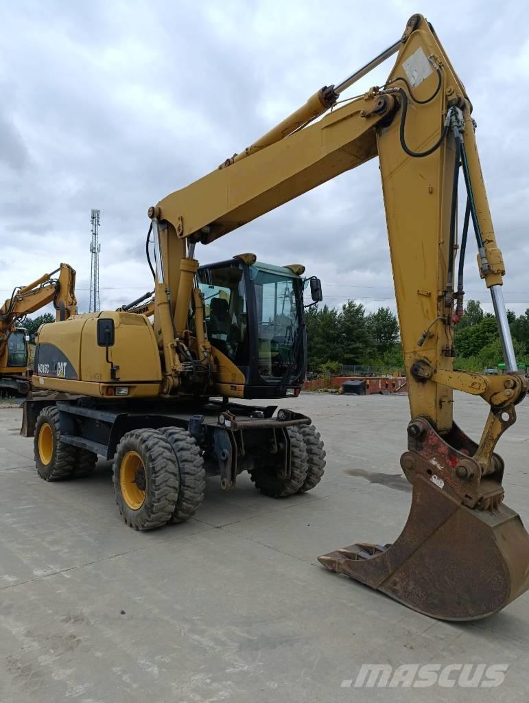 CAT M 316 C Ekskavatori uz riteņiem