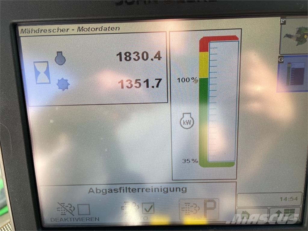 John Deere T660 i Ražas novākšanas kombaini