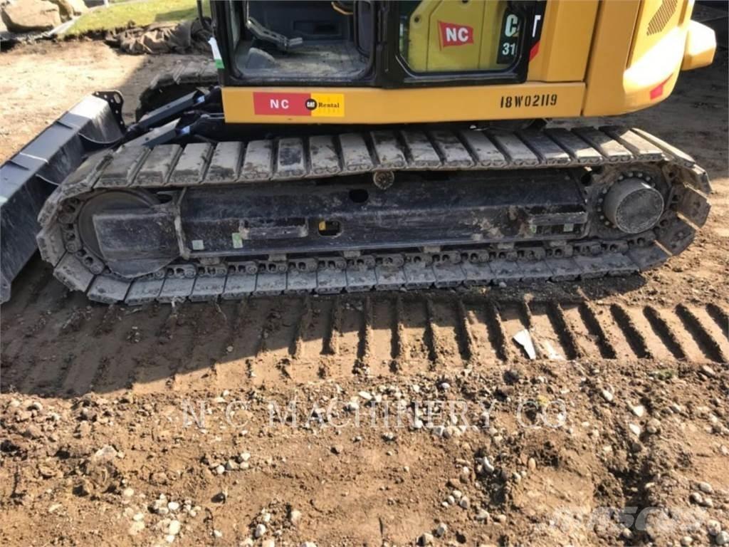 CAT 310 Kāpurķēžu ekskavatori