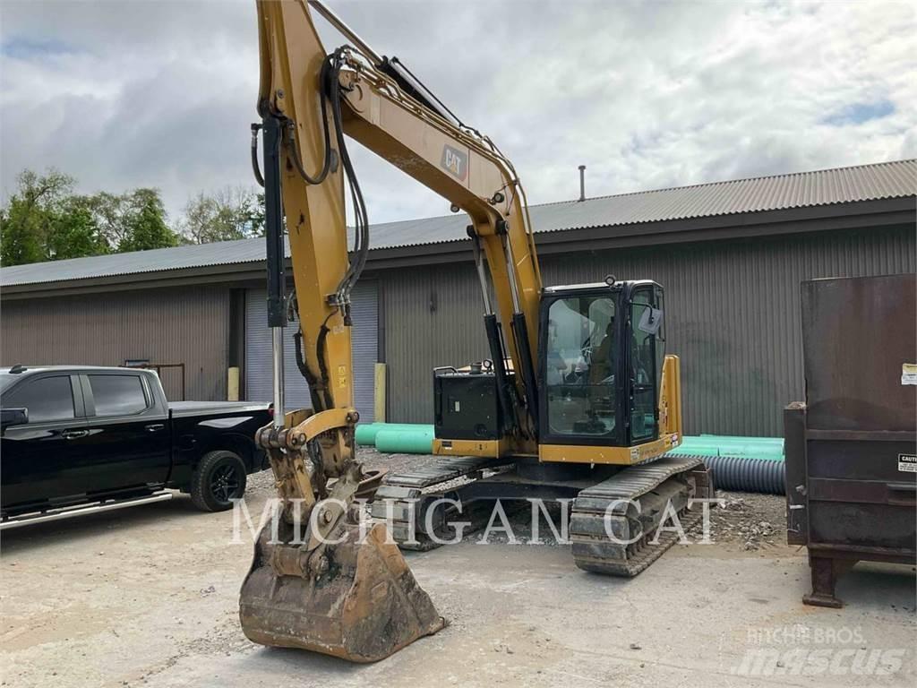 CAT 310 AQ Kāpurķēžu ekskavatori