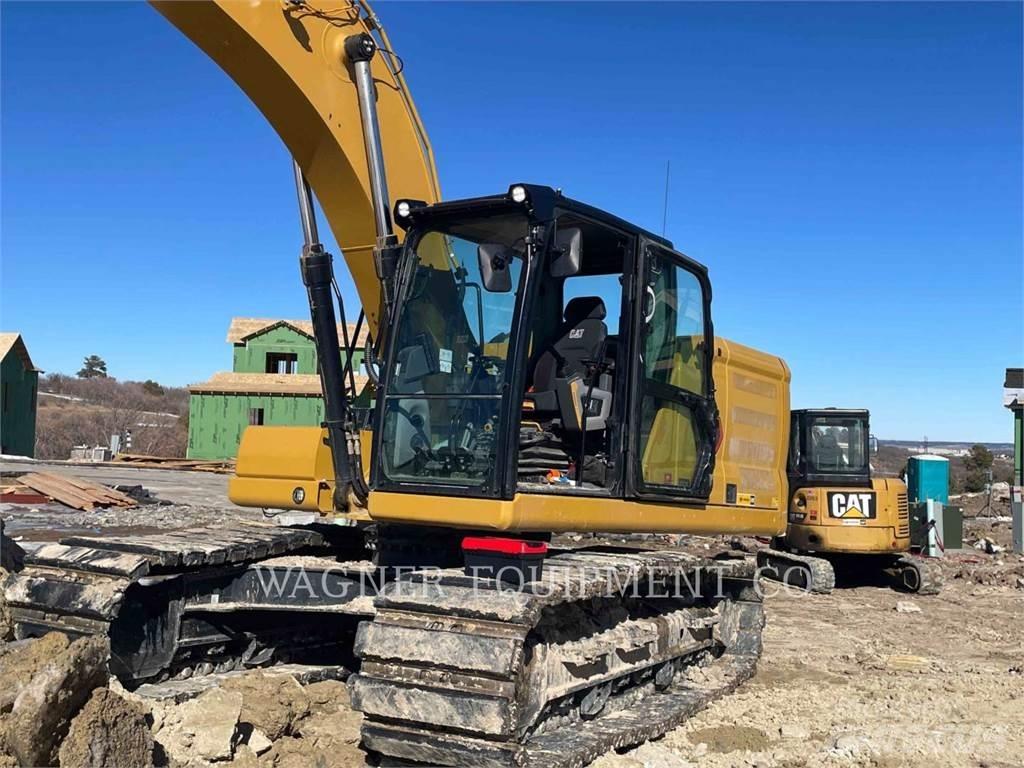 CAT 323 Kāpurķēžu ekskavatori