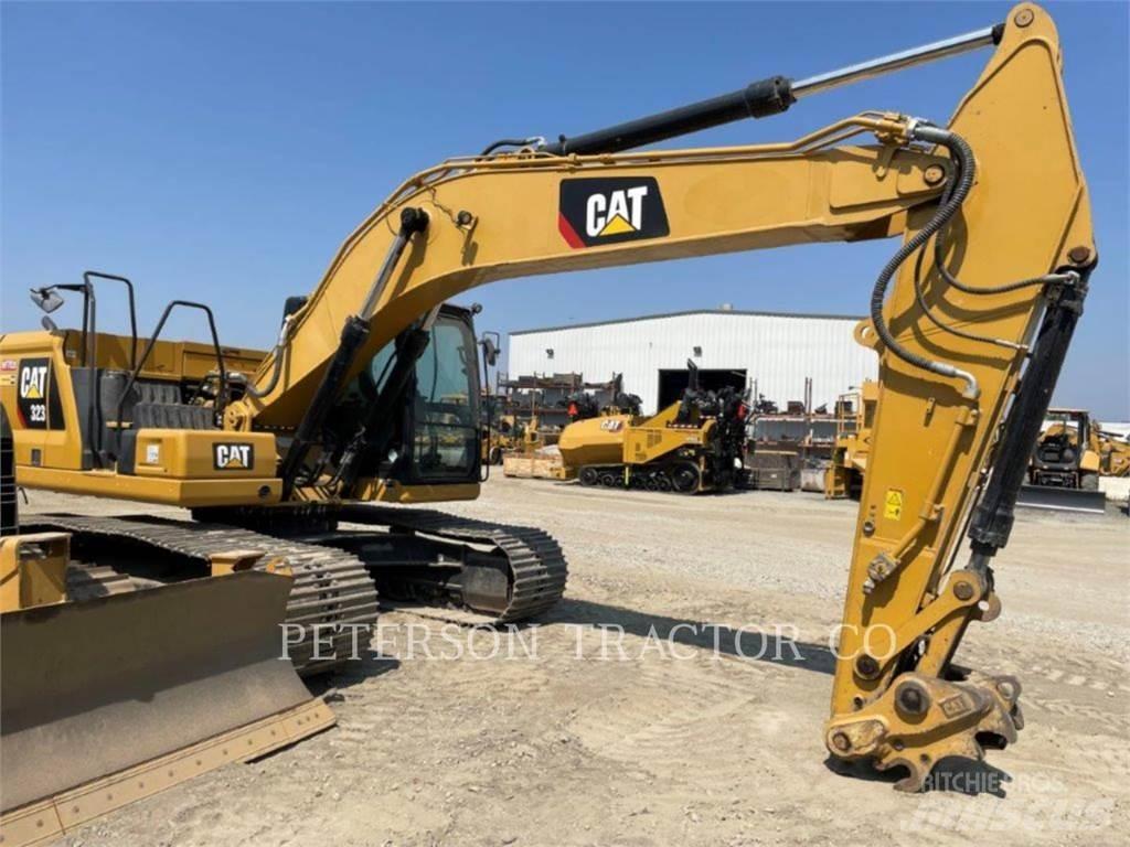 CAT 323 Kāpurķēžu ekskavatori