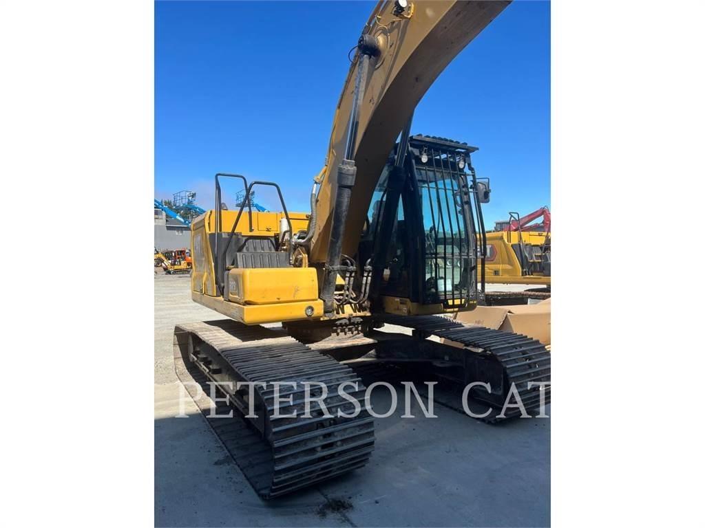 CAT 323 Kāpurķēžu ekskavatori