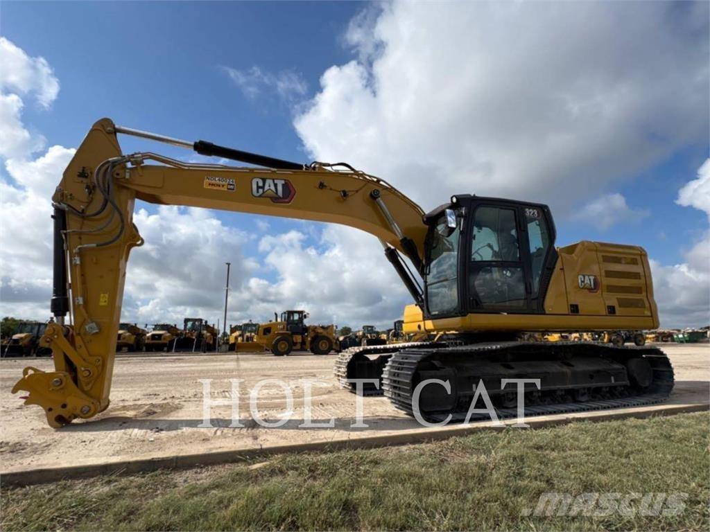 CAT 323 TC Iekrāvēji uz riteņiem