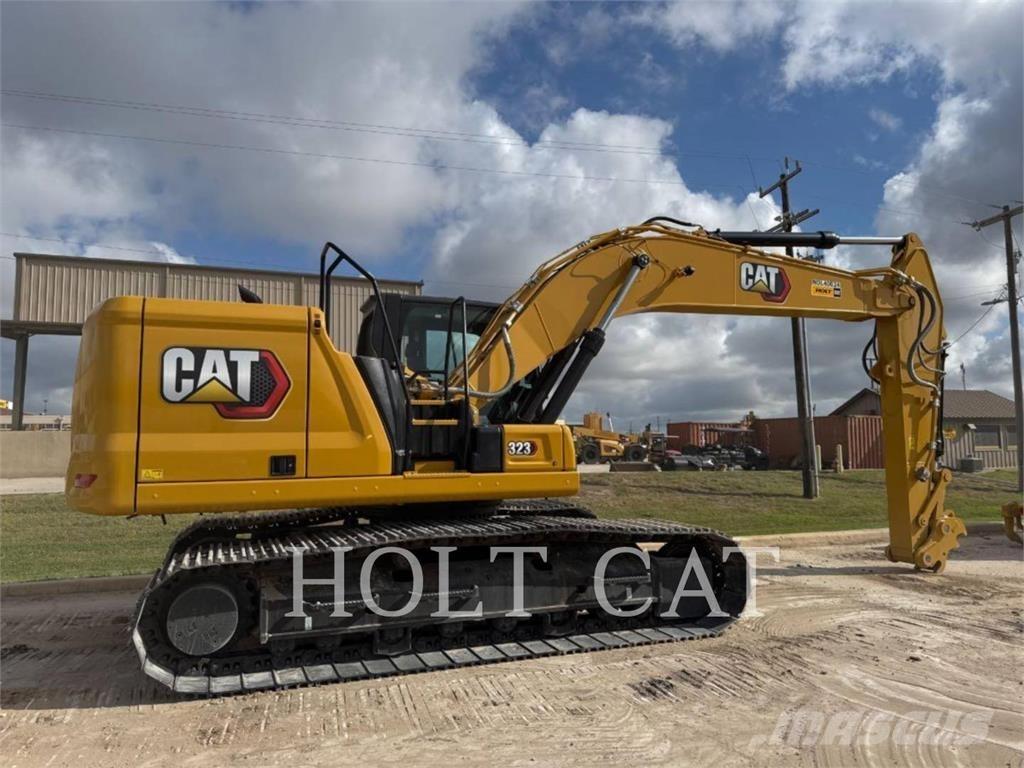 CAT 323 TC Iekrāvēji uz riteņiem