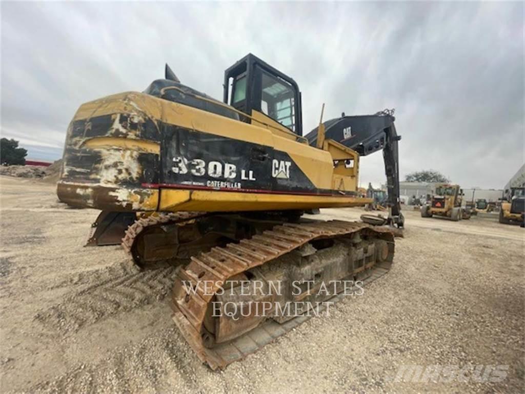 CAT 330B FM Mežizstrādes traktori