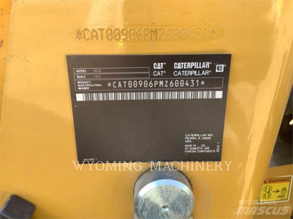 CAT 906 Iekrāvēji uz riteņiem