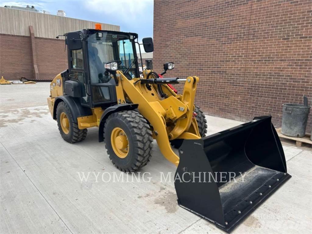 CAT 906 Iekrāvēji uz riteņiem