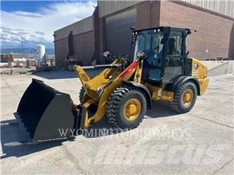 CAT 906 Iekrāvēji uz riteņiem