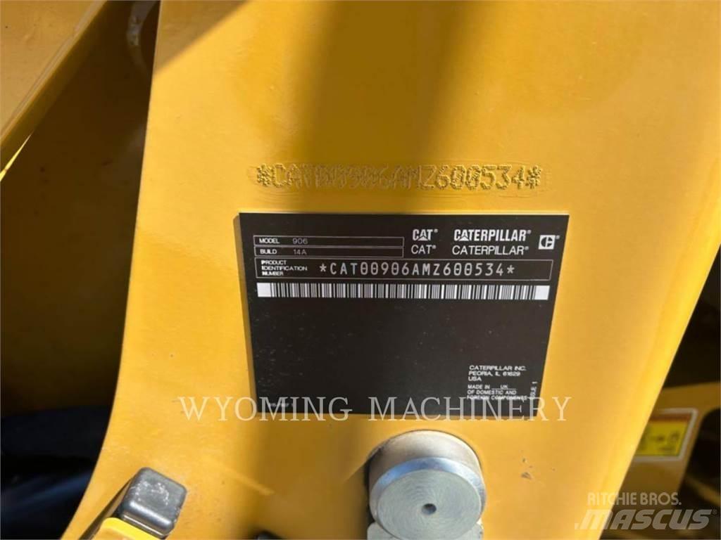 CAT 906 Iekrāvēji uz riteņiem