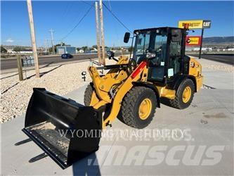 CAT 906 Iekrāvēji uz riteņiem
