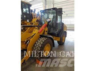 CAT 906 Iekrāvēji uz riteņiem