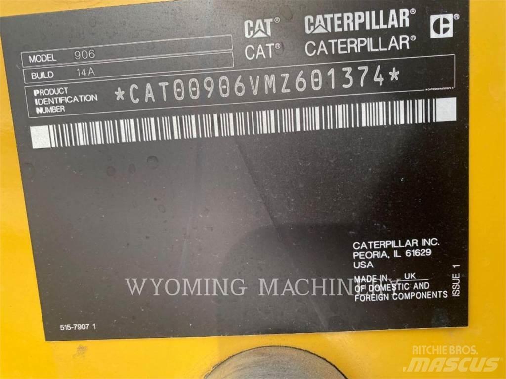 CAT 906 Iekrāvēji uz riteņiem