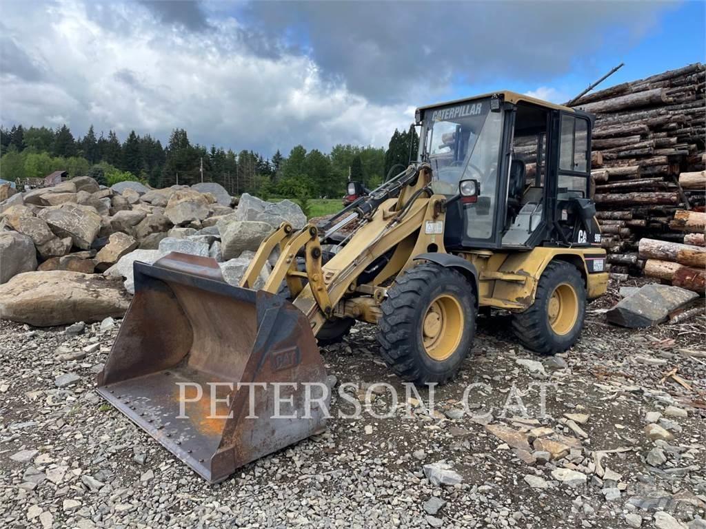 CAT 906 Iekrāvēji uz riteņiem