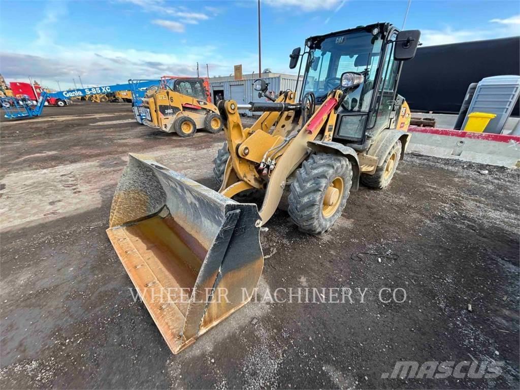 CAT 906 Iekrāvēji uz riteņiem