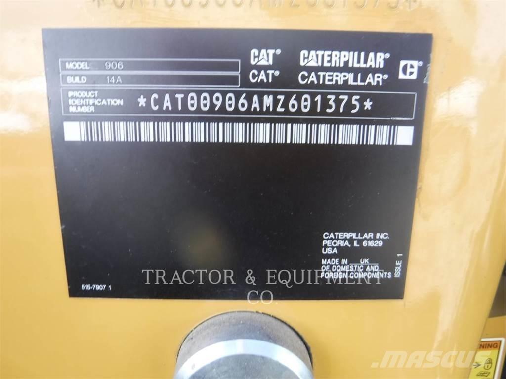 CAT 906 Iekrāvēji uz riteņiem