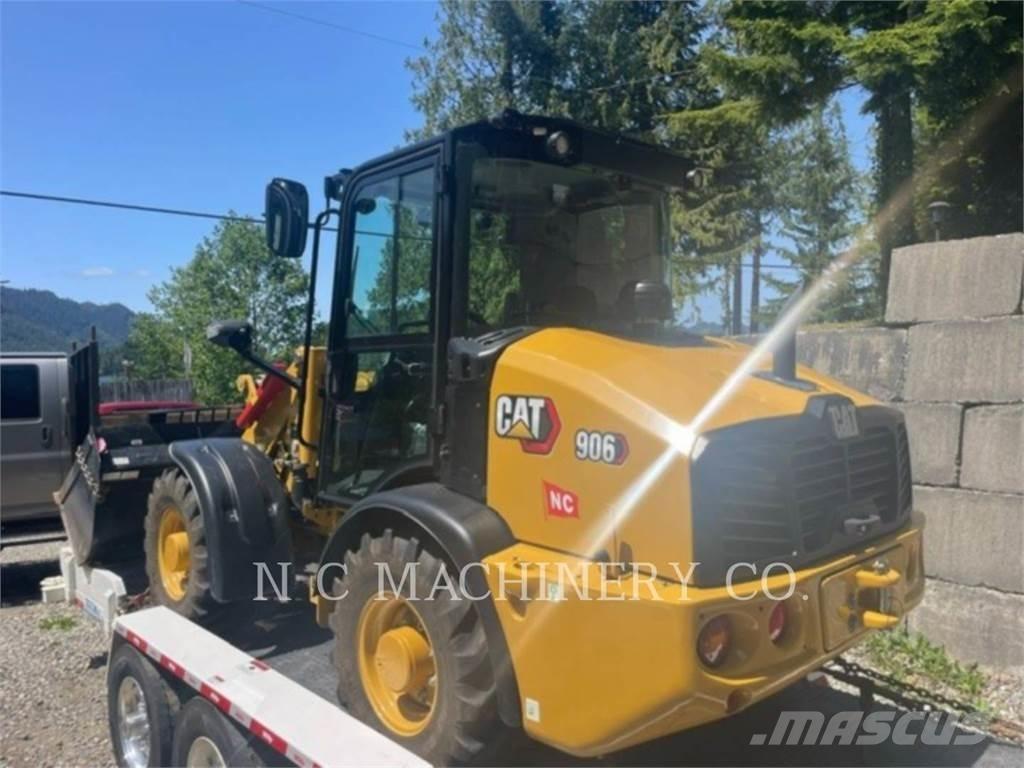CAT 906 Iekrāvēji uz riteņiem