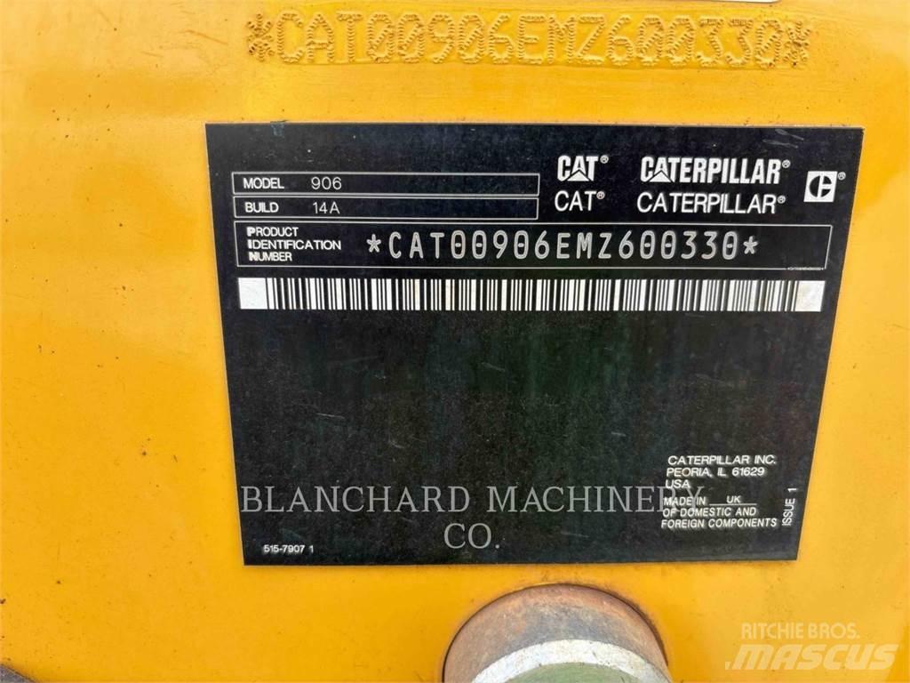 CAT 906 Iekrāvēji uz riteņiem