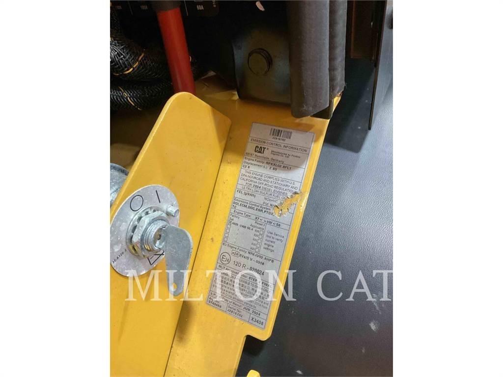 CAT 906 Iekrāvēji uz riteņiem