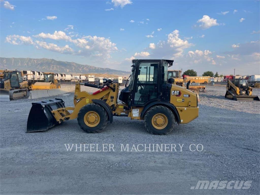 CAT 906 Iekrāvēji uz riteņiem