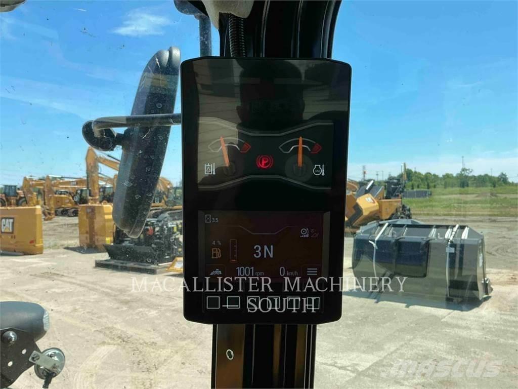 CAT 906 Iekrāvēji uz riteņiem