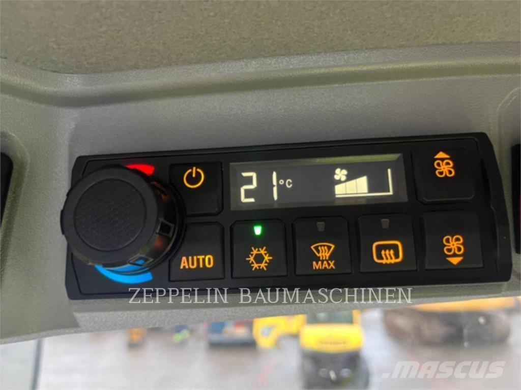 CAT 906-14 Iekrāvēji uz riteņiem