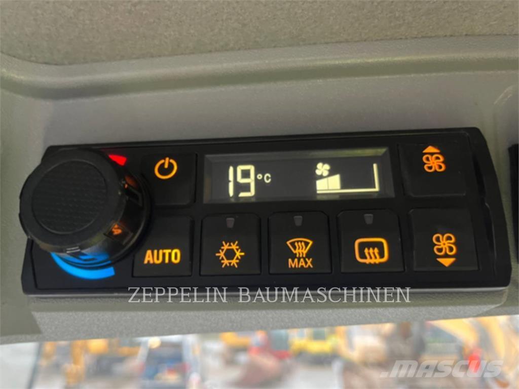 CAT 906-14 Iekrāvēji uz riteņiem