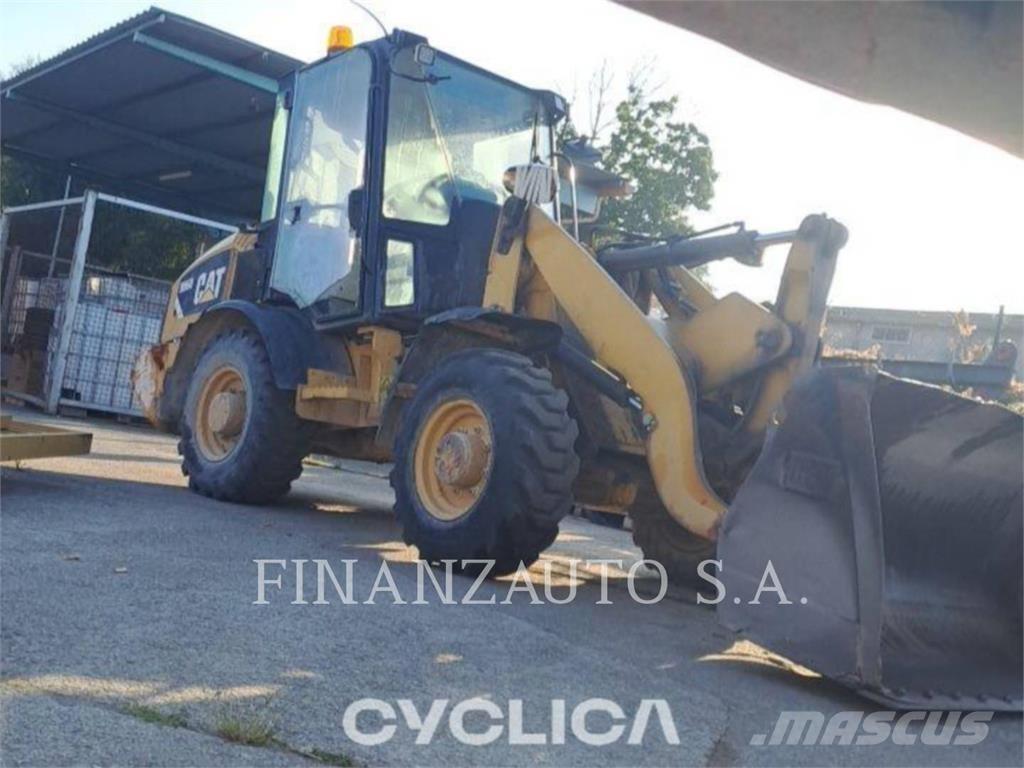 CAT 906H Iekrāvēji uz riteņiem