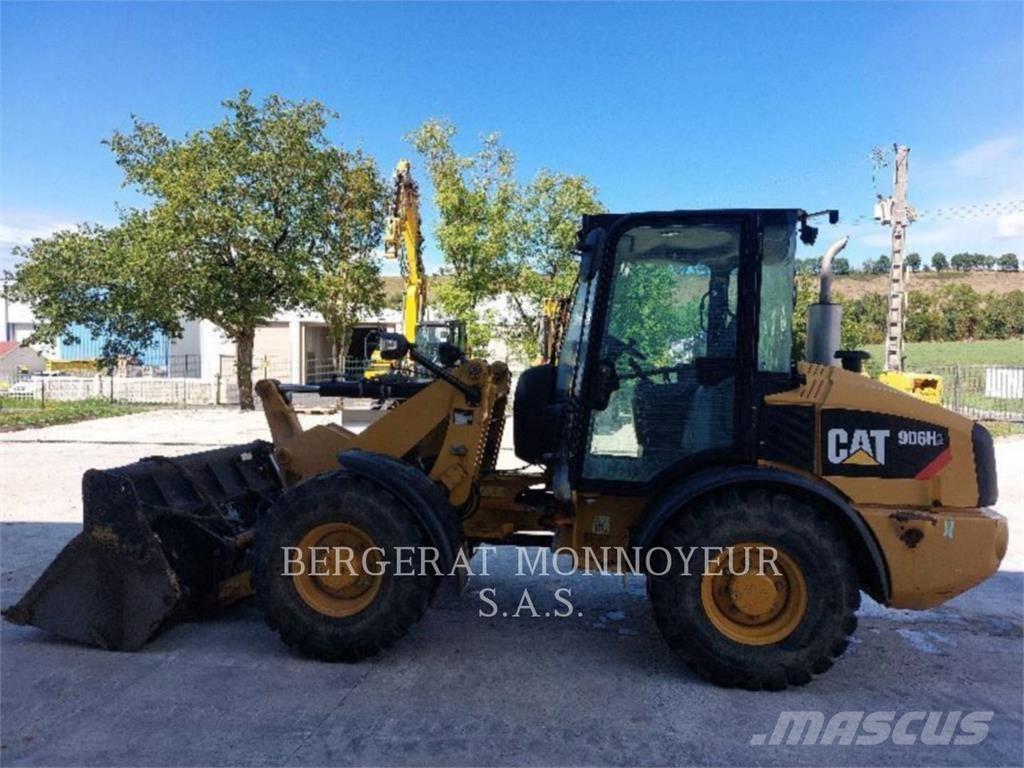 CAT 906H2 Iekrāvēji uz riteņiem