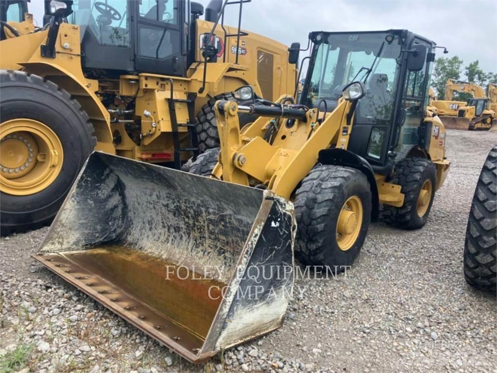 CAT 906M Iekrāvēji uz riteņiem