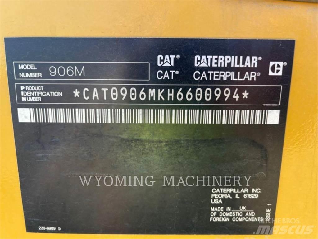 CAT 906M Iekrāvēji uz riteņiem