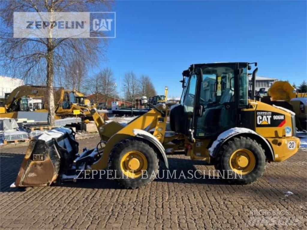 CAT 906M Iekrāvēji uz riteņiem