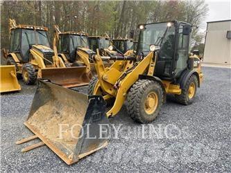 CAT 906M Iekrāvēji uz riteņiem